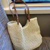 The 2025 new summer woven hollowed-out handbag made of cotton, the same style as the beach bag, is a niche design for women. It is a net bag bag for women details Picture